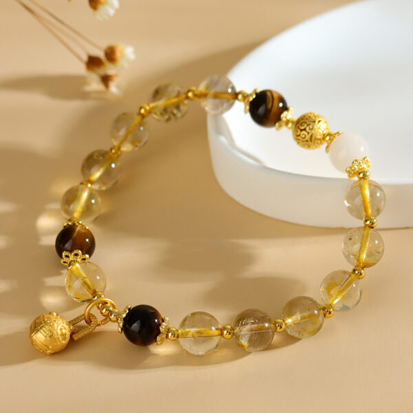 Natural crystal yellow hair crystal tiger eye stone swallowing beast bracelet new Chinese style literary fashion bracelet jewelry gift