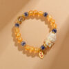 Gold foil glass half sugar heart agate Xiaolongnu bracelet new cultural and creative hot original bracelet