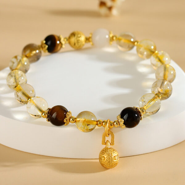 Natural crystal yellow hair crystal tiger eye stone swallowing beast bracelet new Chinese style literary fashion bracelet jewelry gift