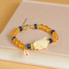Gold foil glass half sugar heart agate Xiaolongnu bracelet new cultural and creative hot original bracelet