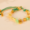 Golden color sand gold multi-treasure winding Tibetan style colored rope bracelet niche light luxury design ancient method braided bracelet