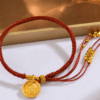 Ancient gold Tibetan style yellow god of wealth round plate hand-woven rope bracelet tassel broken gold zodiac year red rope bracelet