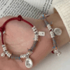 Peace and joy bell transfer braided red rope female niche retro exquisite high-end silver bracelet gift