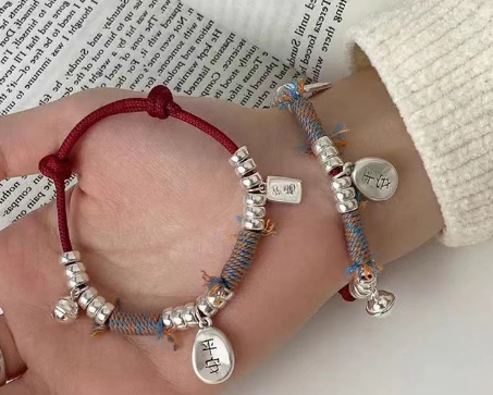 Peace and joy bell transfer braided red rope female niche retro exquisite high-end silver bracelet gift