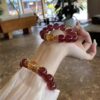 Natural strawberry crystal bracelet to attract peach blossom yellow glue flower bracelet niche design high-end feeling happy fire earth to replenish fire to send friends