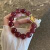 Natural strawberry crystal bracelet to attract peach blossom yellow glue flower bracelet niche design high-end feeling happy fire earth to replenish fire to send friends